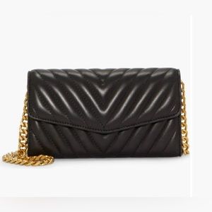 Theon Quilted Wallet on a Chain
Vince Camuto